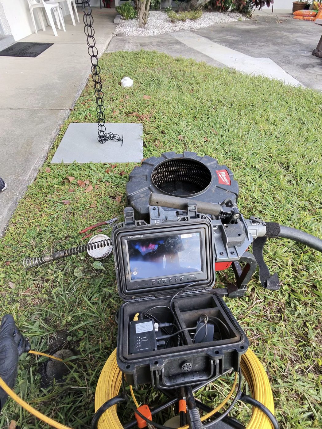 Sewer camera inspection system set up at a Pinellas County, FL job site for real-time drain diagnosis